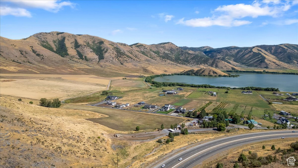 Exterior space featuring a rural view and a water and mountain view