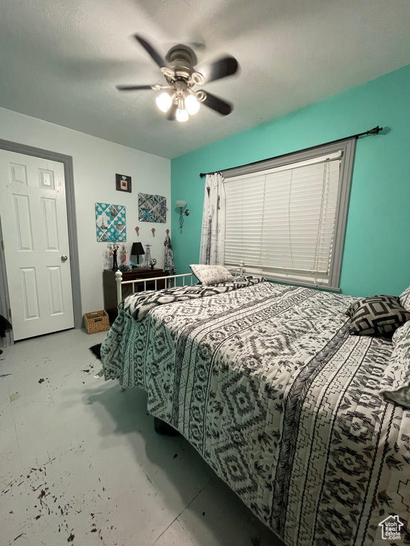 Bedroom featuring ceiling fan