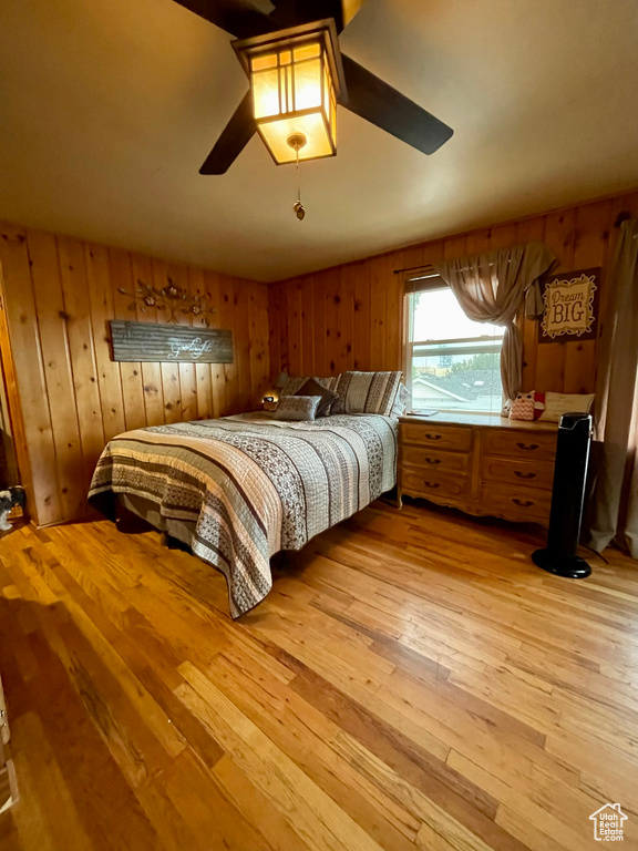Bedroom with light hardwood / wood-style floors