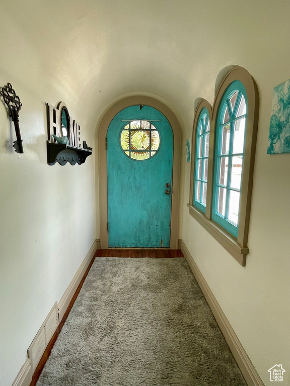 Doorway featuring hardwood / wood-style flooring