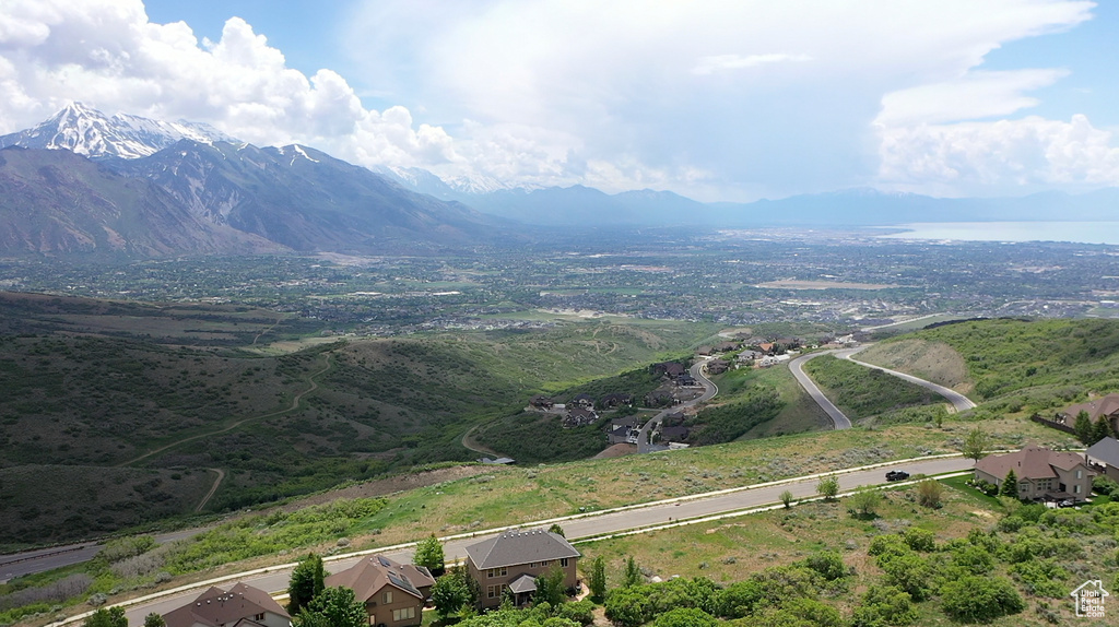 Birds eye view of property with a mountain view