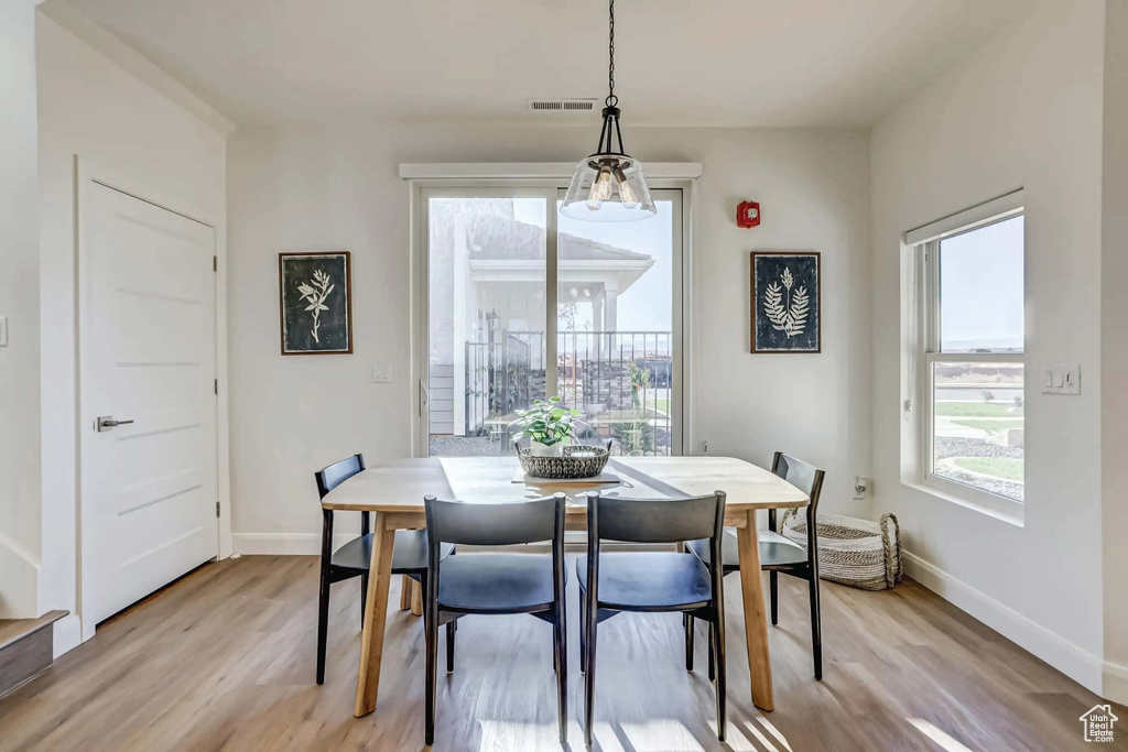 Dining space featuring light hardwood / wood-style floors