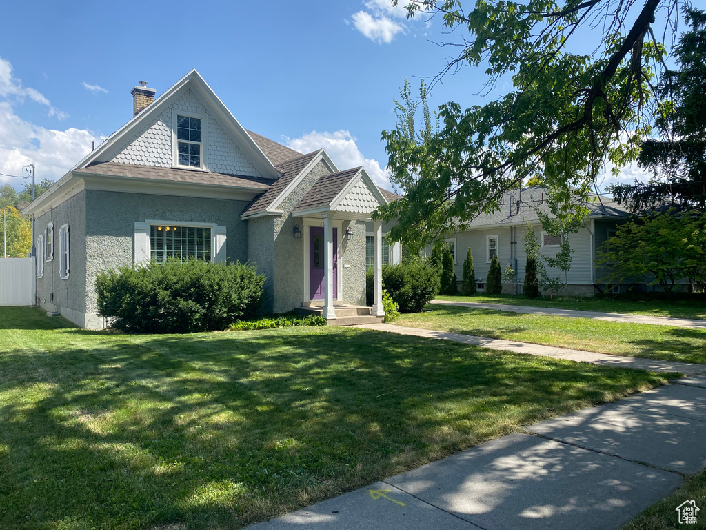 View of front of home with a front yard