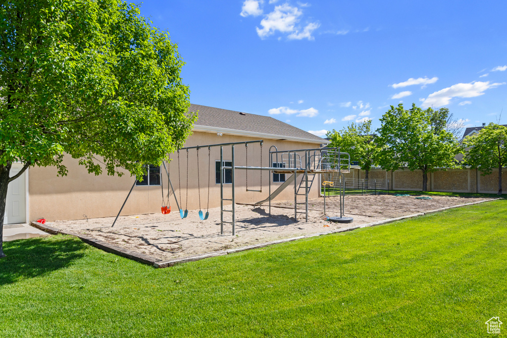 View of yard with a playground