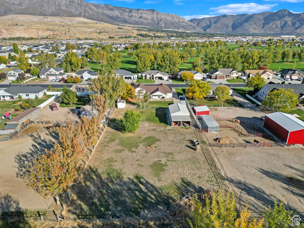 Birds eye view of property featuring a mountain view