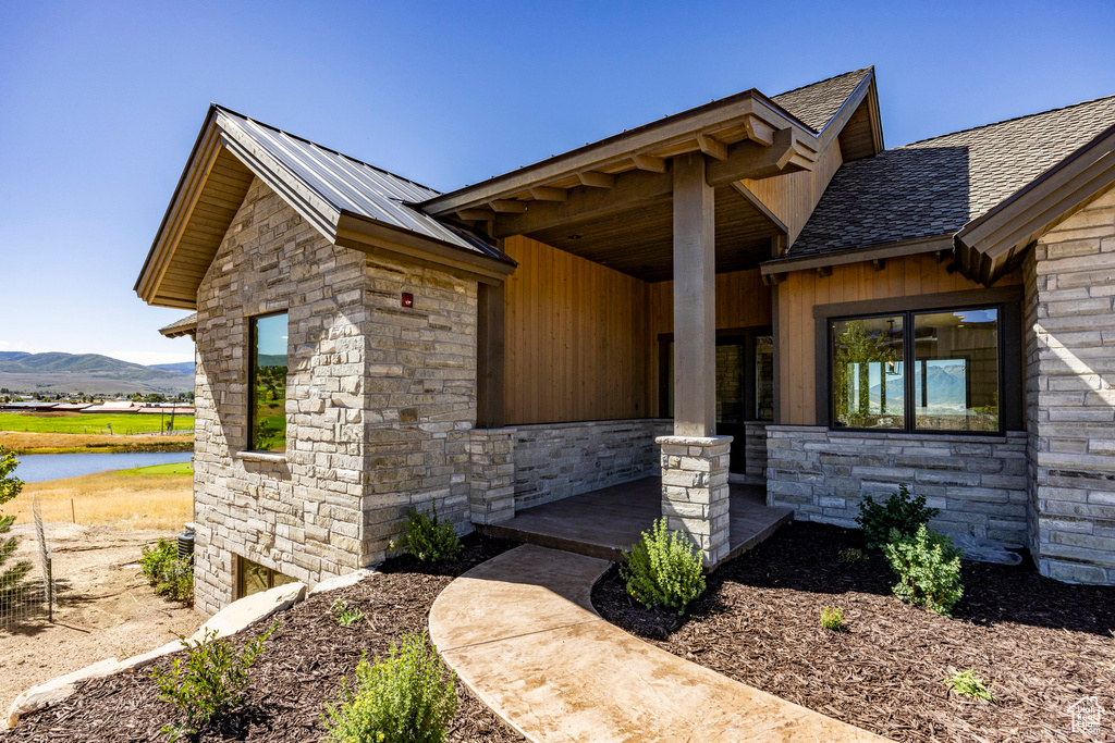 Property entrance with a mountain view