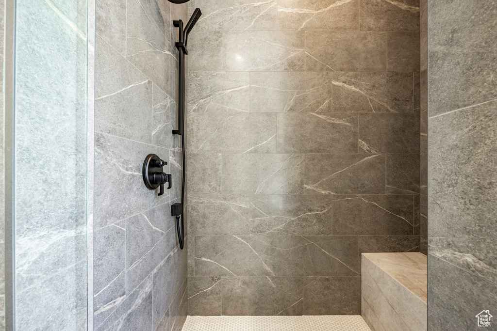 Bathroom with a tile shower