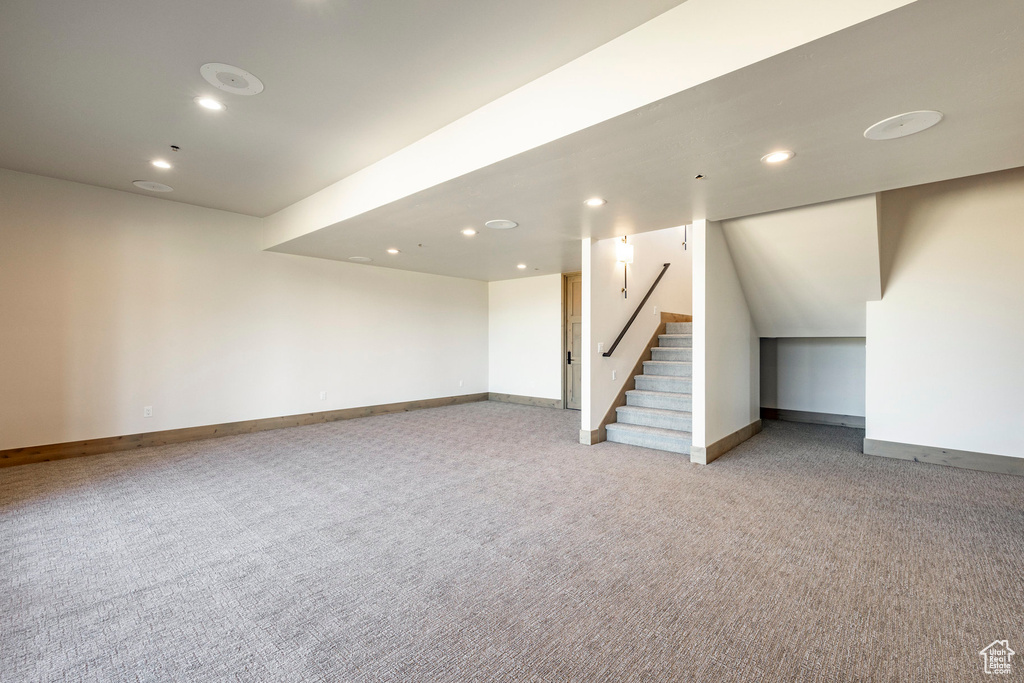 Basement with light carpet