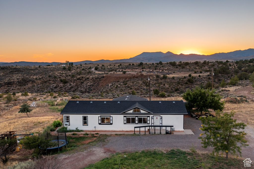 Exterior space featuring a mountain view and a patio