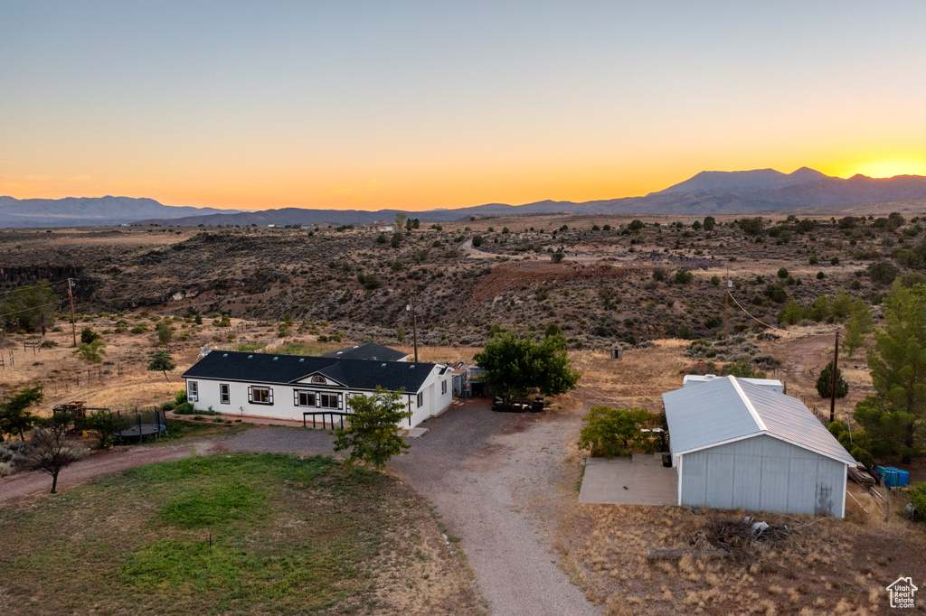 Aerial view at dusk with a mountain view