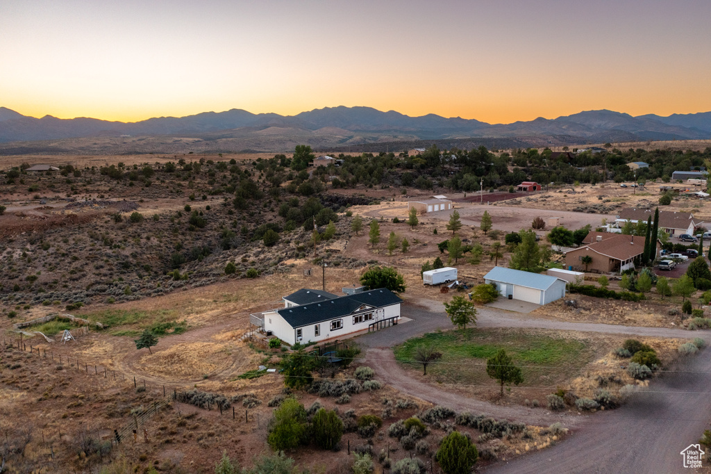 Aerial view at dusk with a mountain view