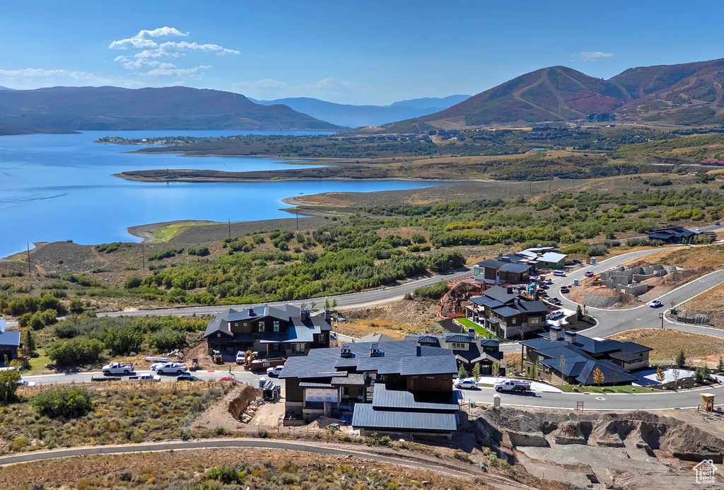 Aerial view with a water and mountain view