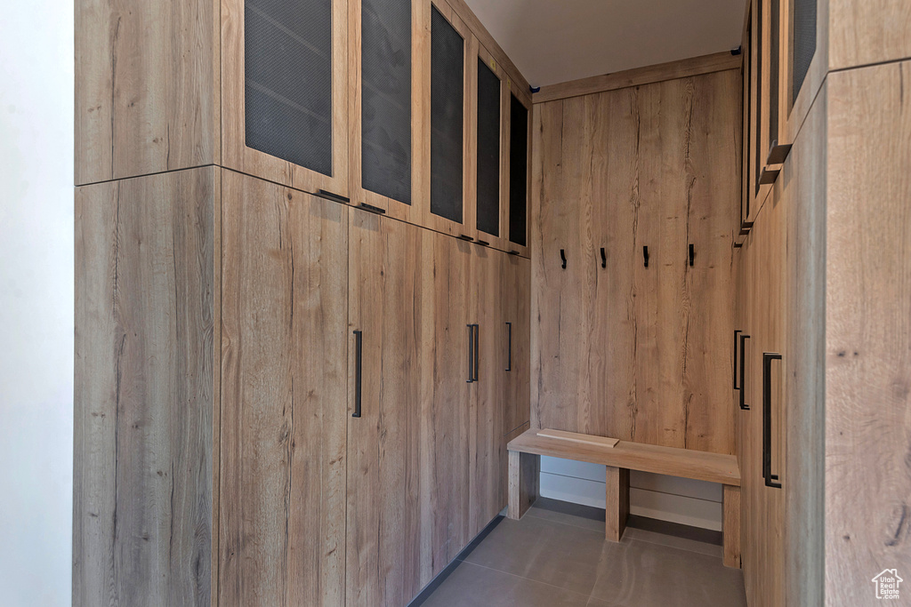 Mudroom with wood walls