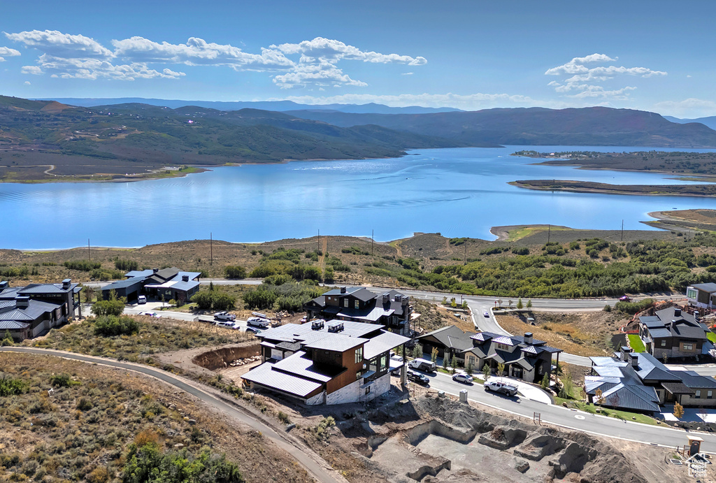 Bird's eye view featuring a water and mountain view