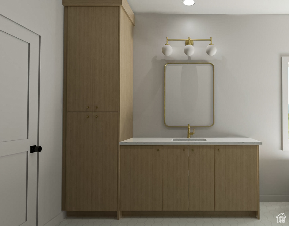 Bathroom with tile patterned flooring and vanity