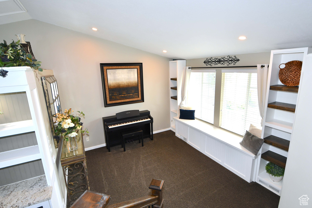 Interior space with vaulted ceiling