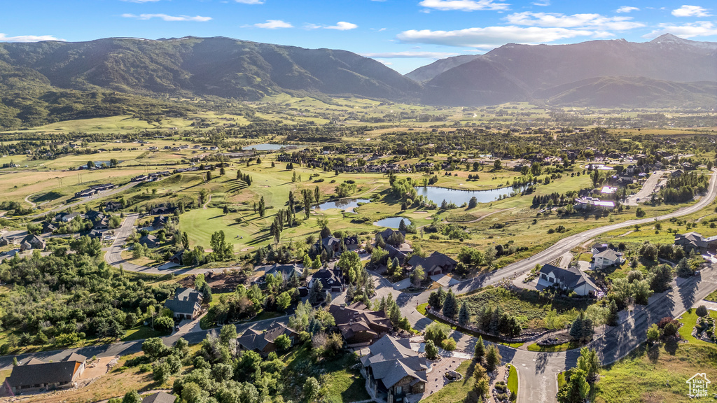 Bird's eye view with a water and mountain view