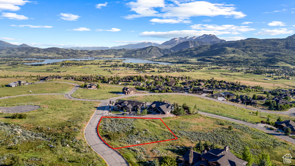 Aerial view with a water and mountain view