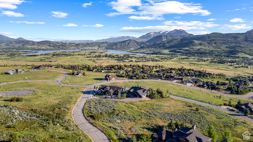 Bird's eye view featuring a water and mountain view