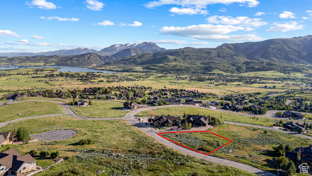 Bird's eye view with a water and mountain view