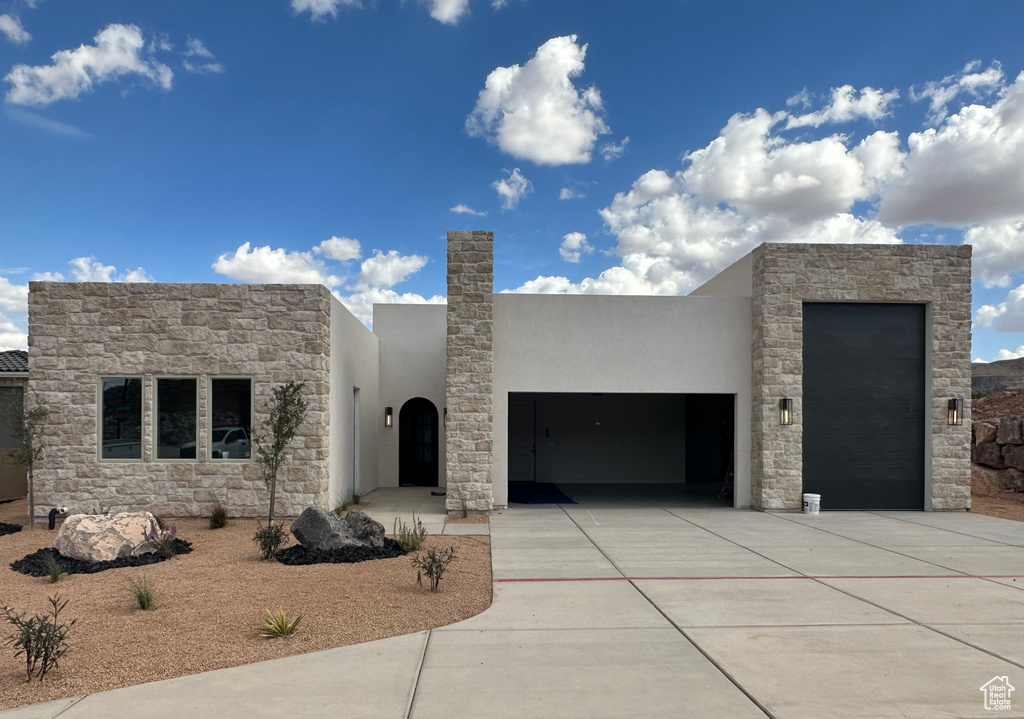 View of front facade with a garage