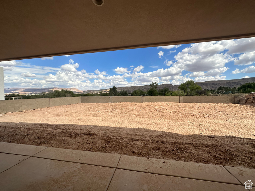 View of yard with a mountain view