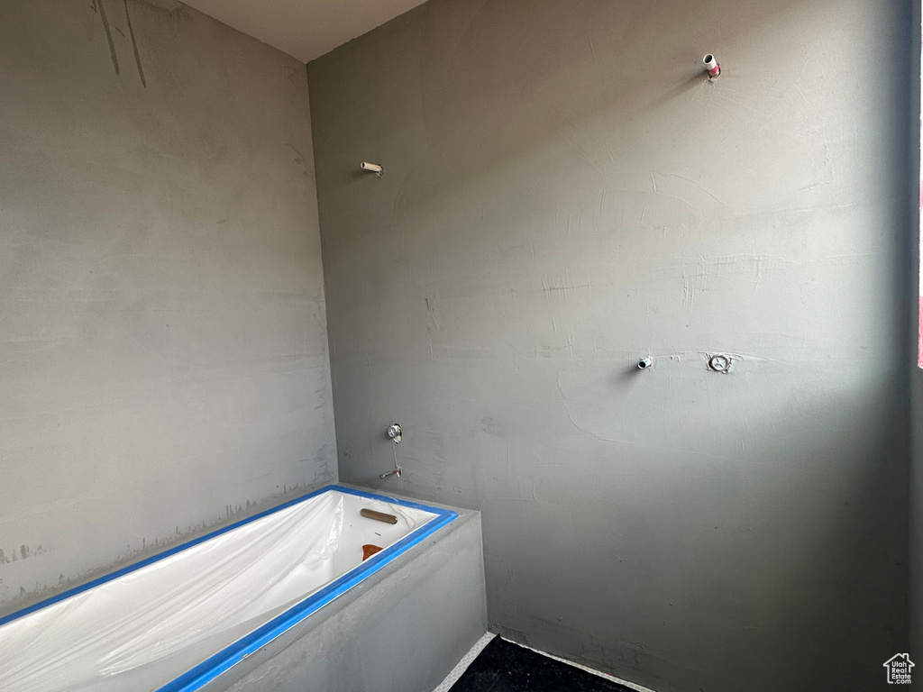 Bathroom with a tub to relax in