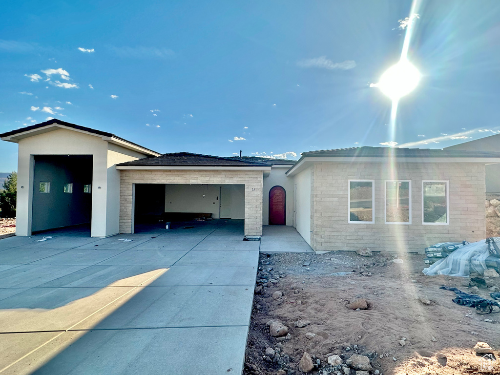 View of front of house with a garage