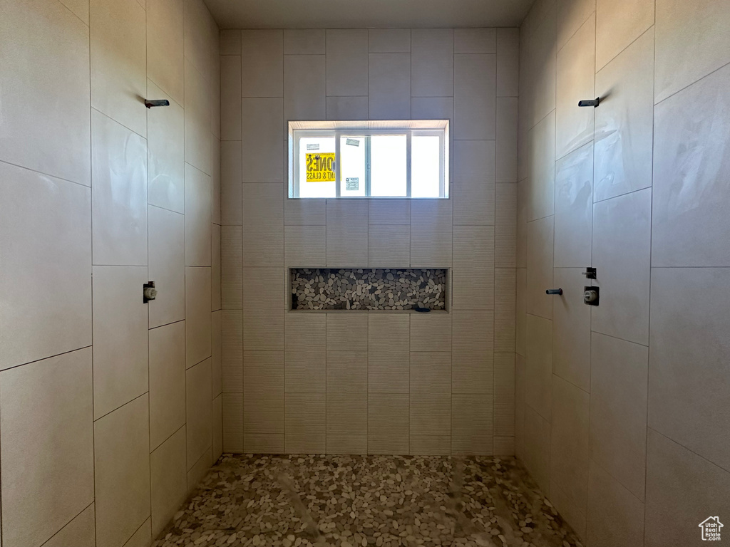 Bathroom with tiled shower