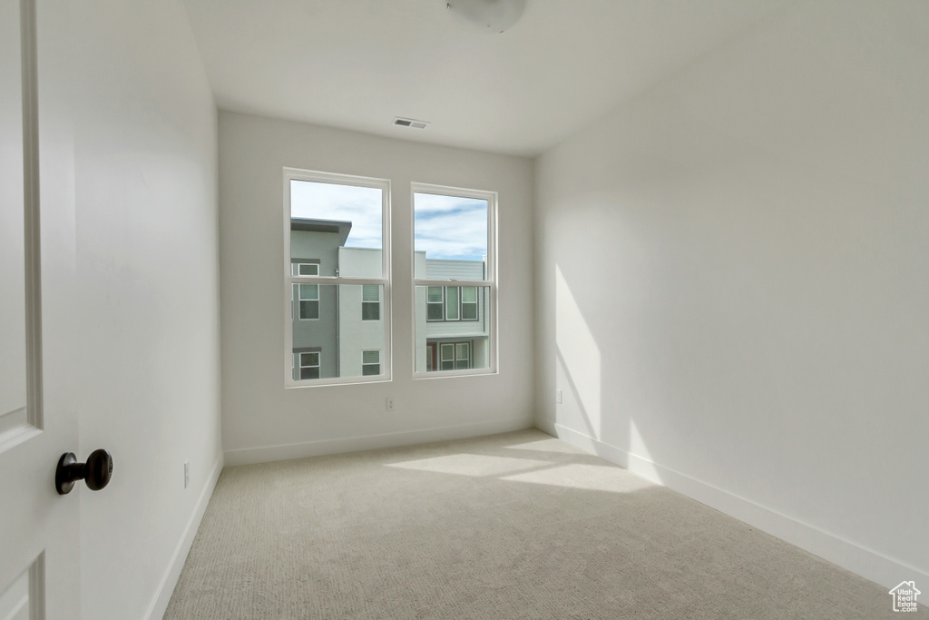 Unfurnished room featuring carpet floors