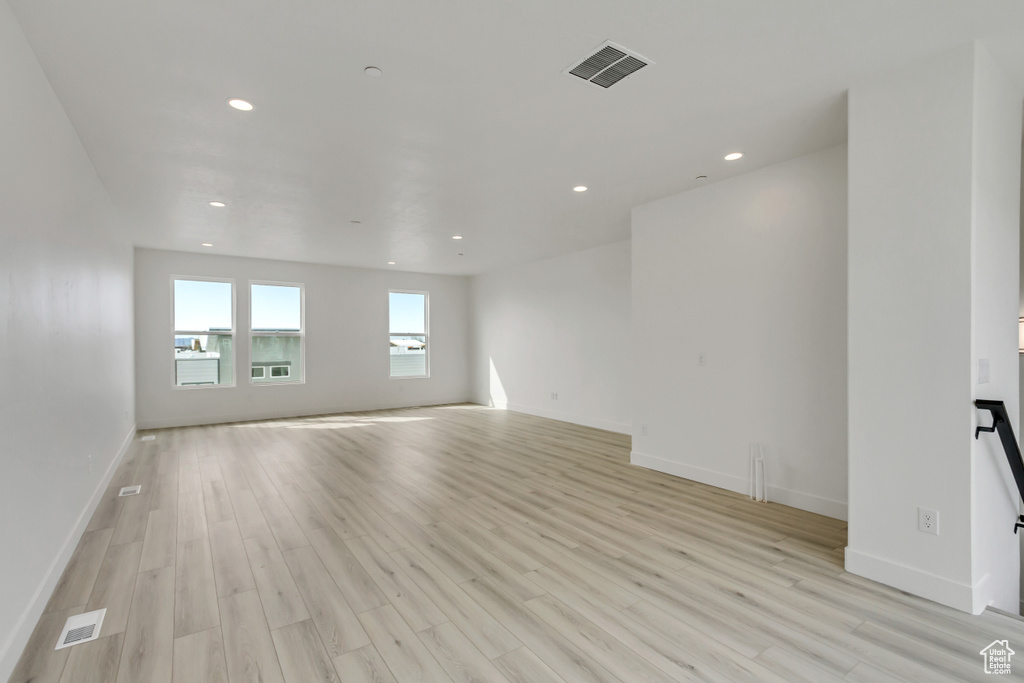 Unfurnished room with light hardwood / wood-style flooring