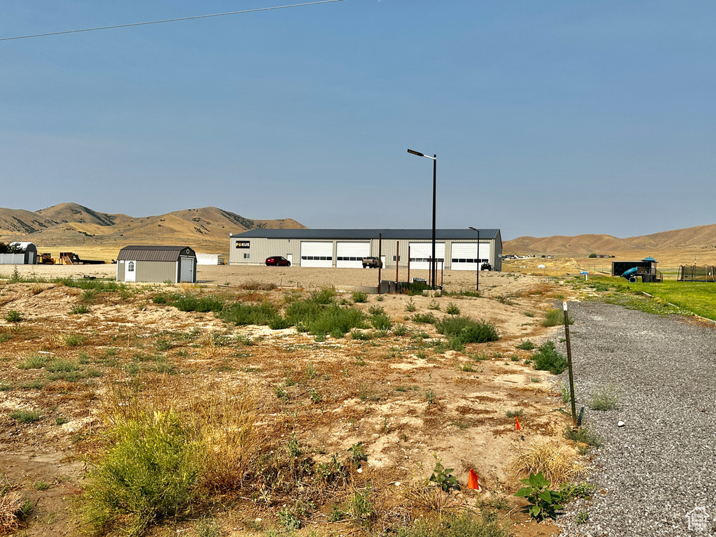 Exterior space with a rural view and a mountain view