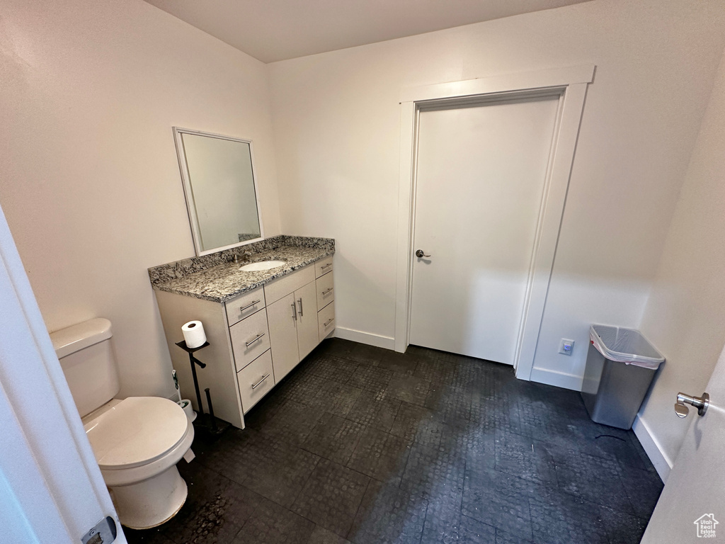 Bathroom with toilet and vanity