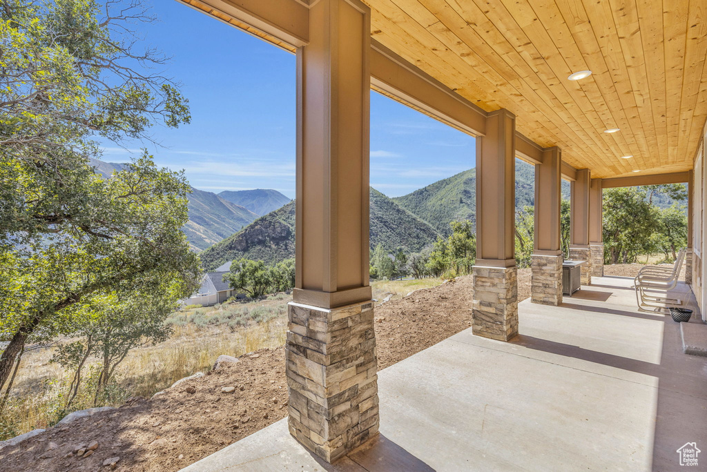 View of patio / terrace featuring a mountain view