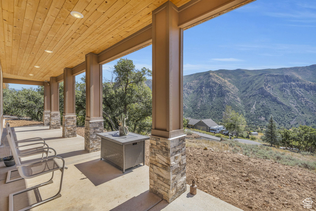 View of patio featuring a mountain view