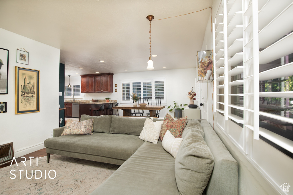 Living room with light wood-type flooring