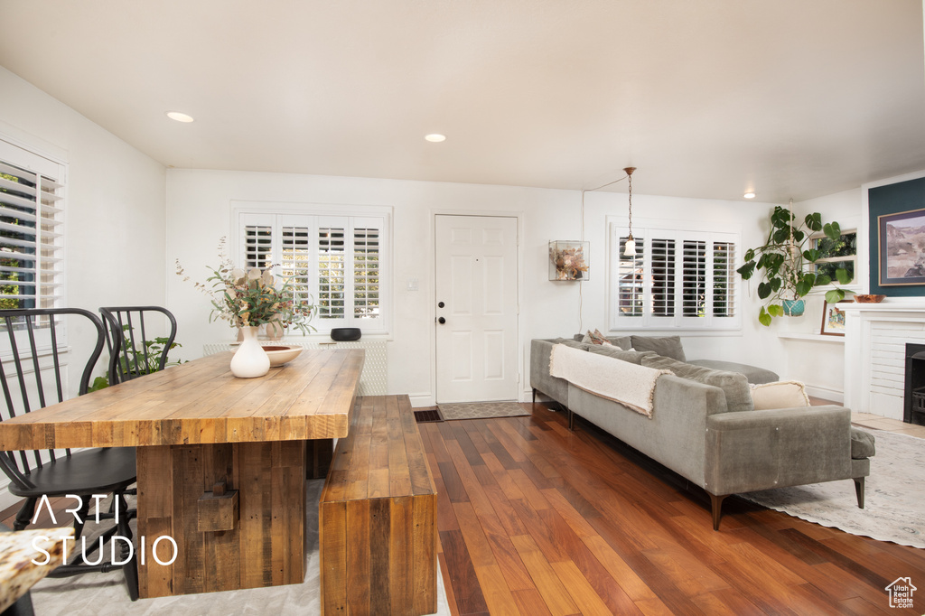 Dining area featuring dark hardwood / wood-style flooring