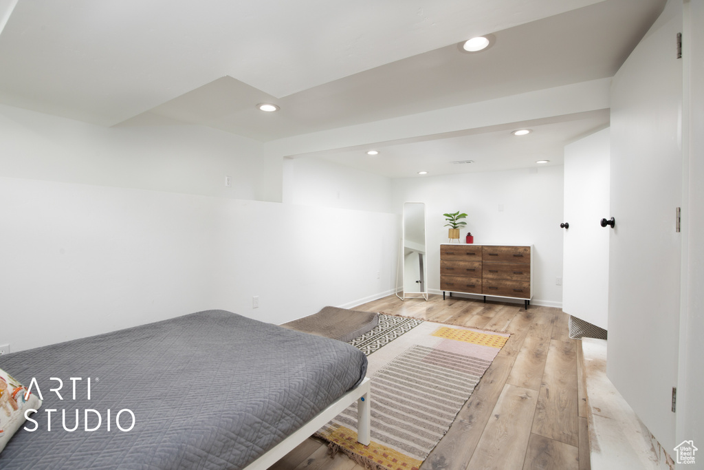 Bedroom with light wood-type flooring