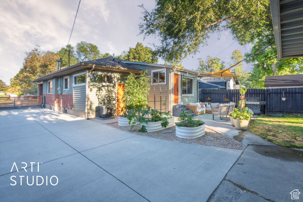 Exterior space featuring an outdoor living space