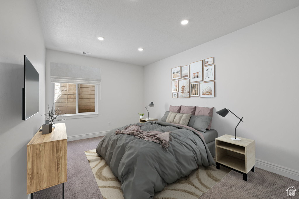 Bedroom featuring carpet flooring