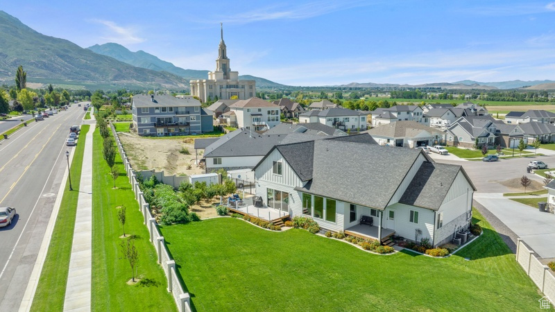 Birds eye view of property with a mountain view