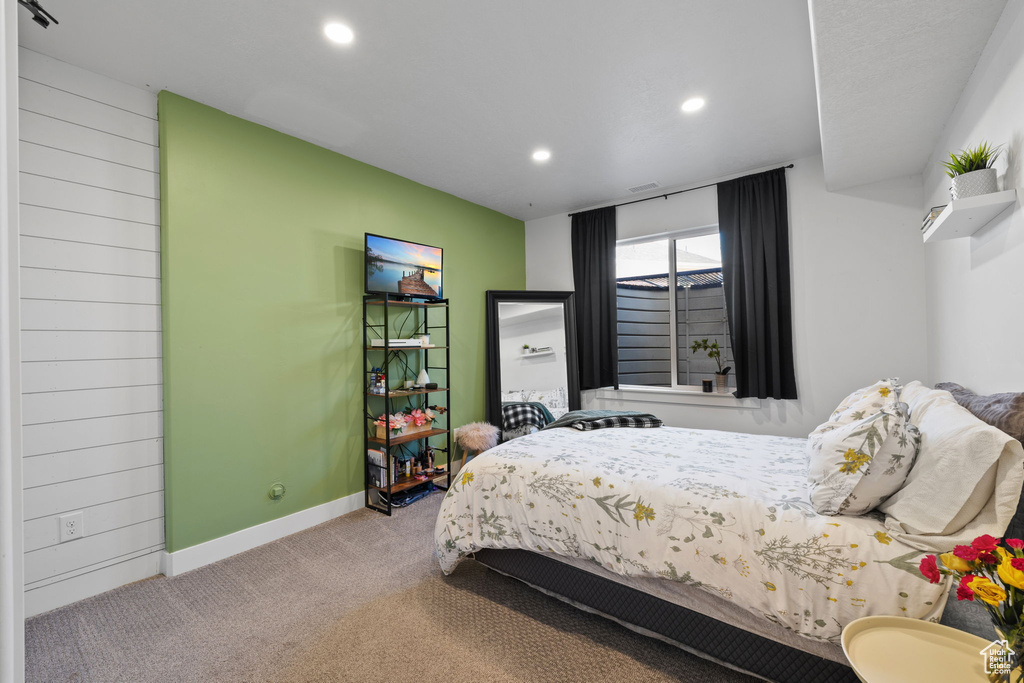 Bedroom with carpet flooring