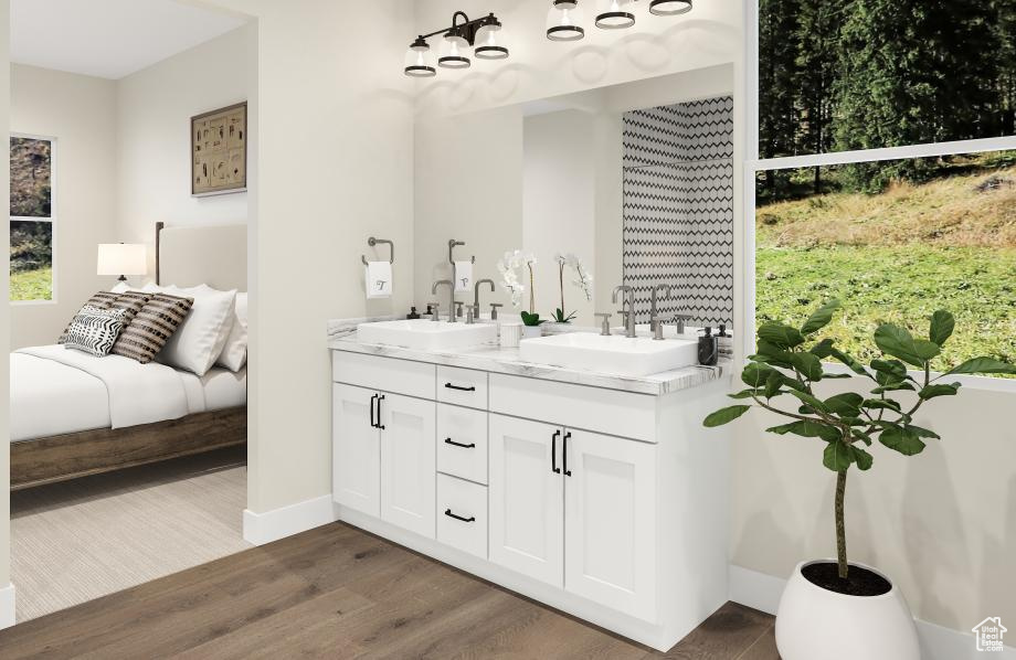 Bathroom featuring vanity and hardwood / wood-style flooring