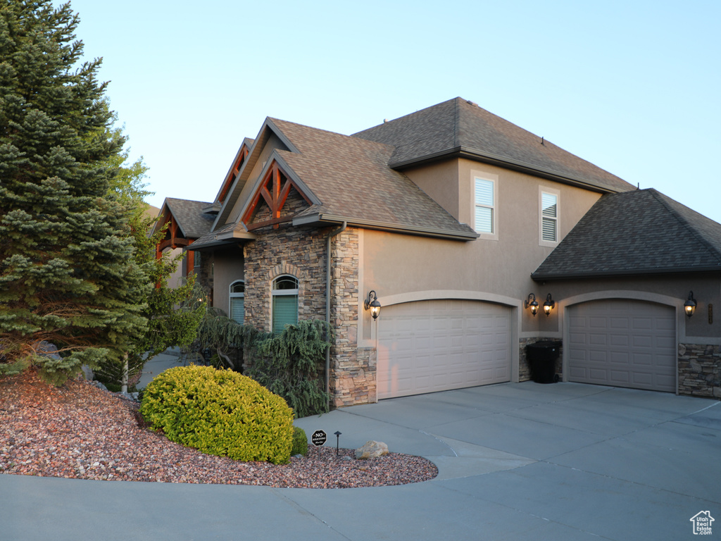 View of front of property with a garage