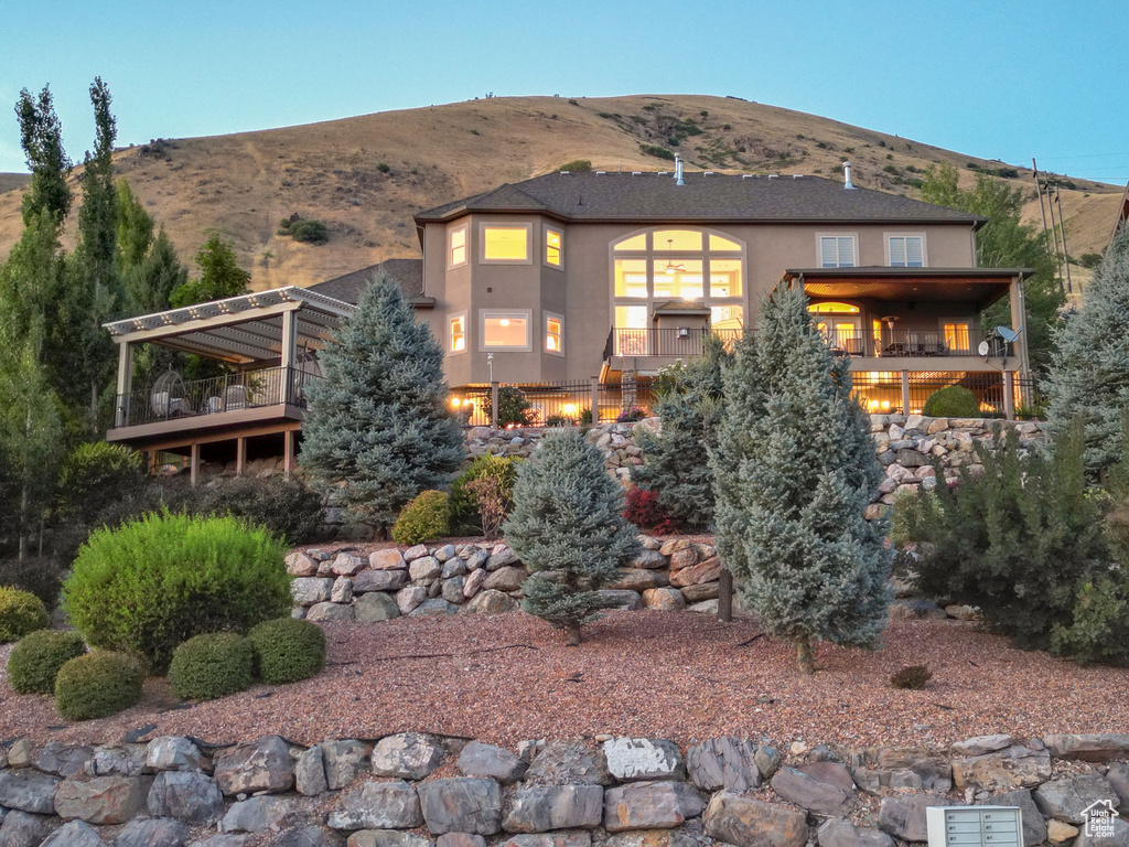 View of front of property featuring a mountain view