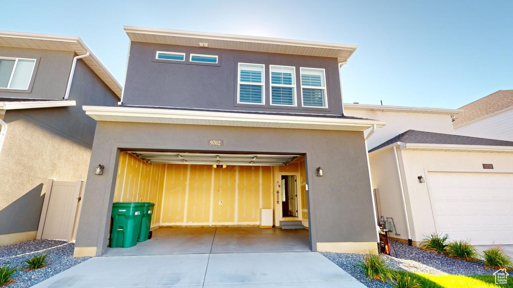 View of front of house with a garage