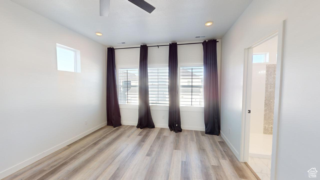 Spare room with light wood-type flooring