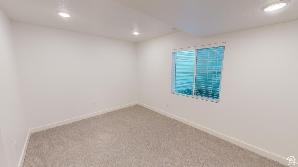 View of carpeted spare room