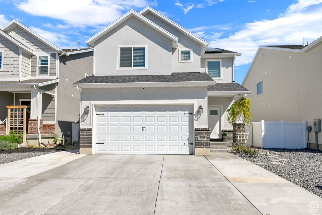 View of front of house with a garage