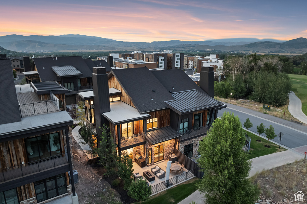 Aerial view at dusk with a mountain view